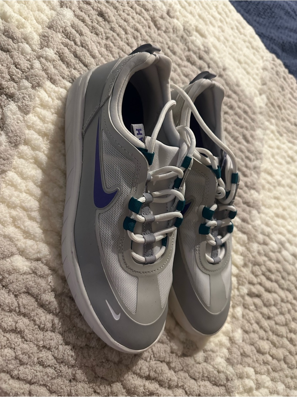 Nike White Sneakers with Purple Insole and Teal Accents
